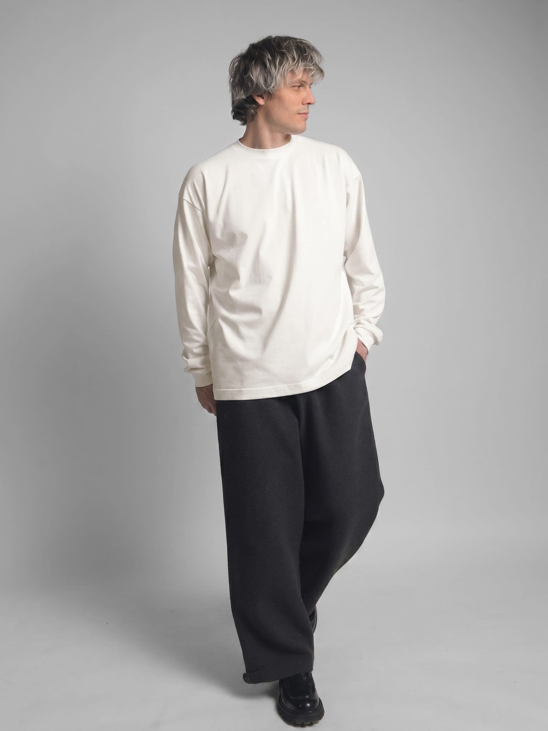 365.APParel Basic Longsleeve Off White — man, cropped side view, sunglasses, looking out window, indoor