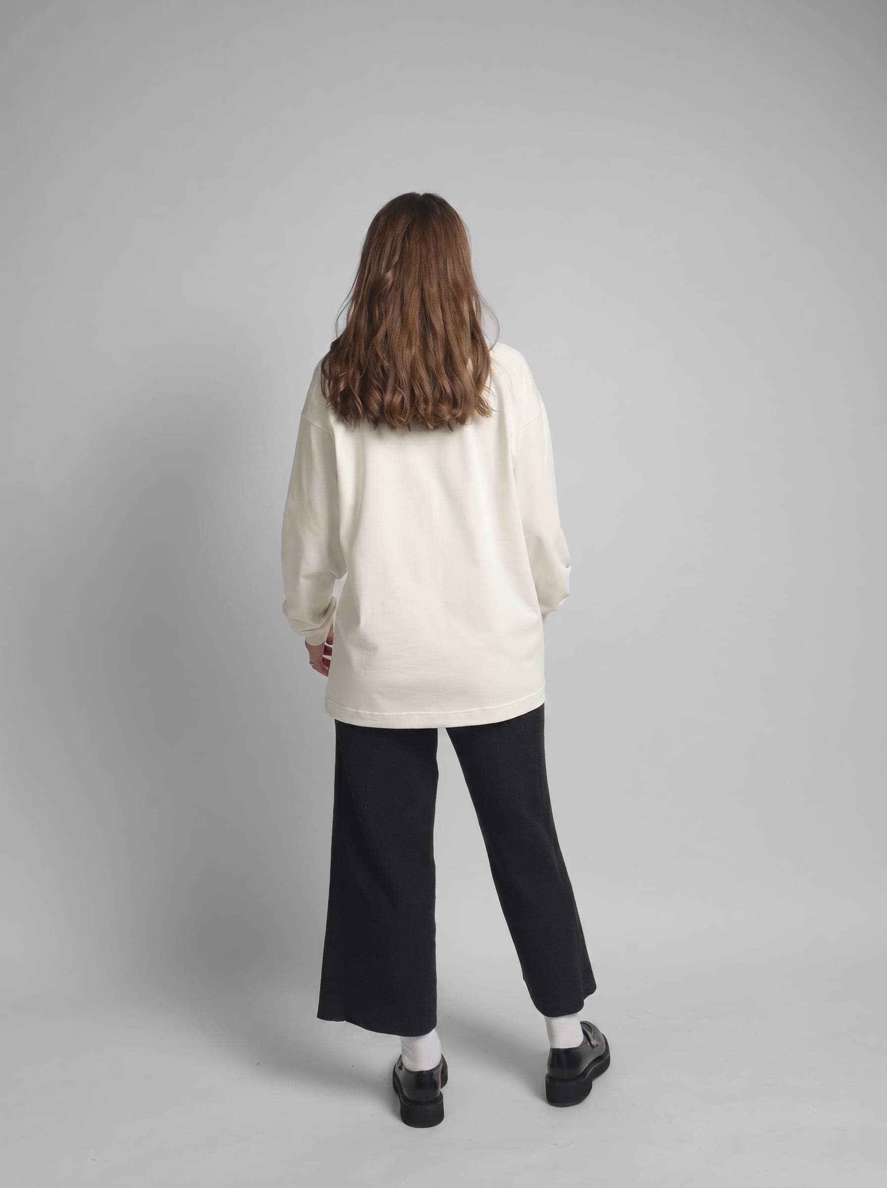 365.APParel Basic Longsleeve Off White — woman, full body back view, studio