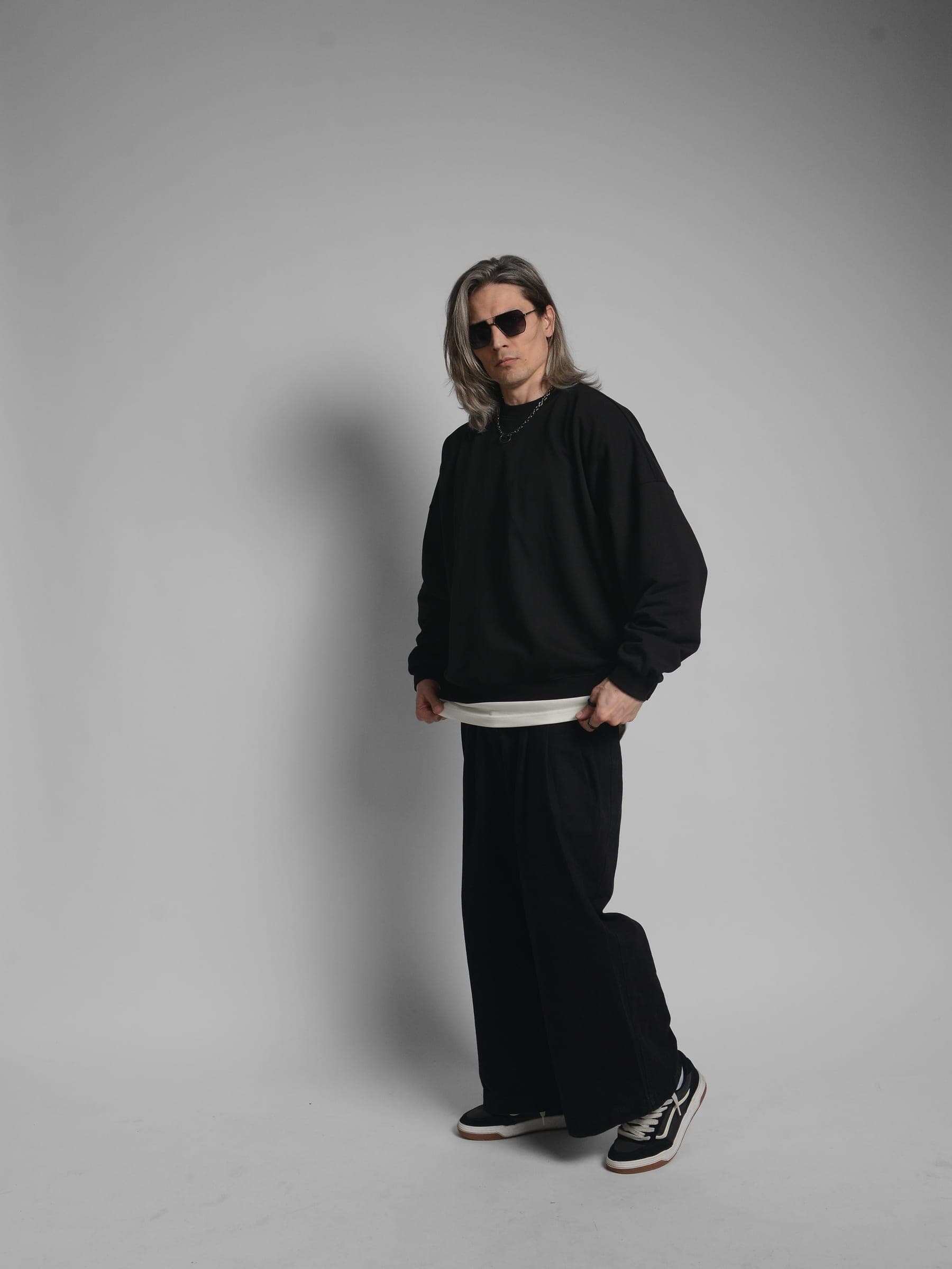 365.APParel Oversize Sweatshirt Black — man, full body three-quarter front view, sunglasses, long silver hair, relaxed pose, studio
