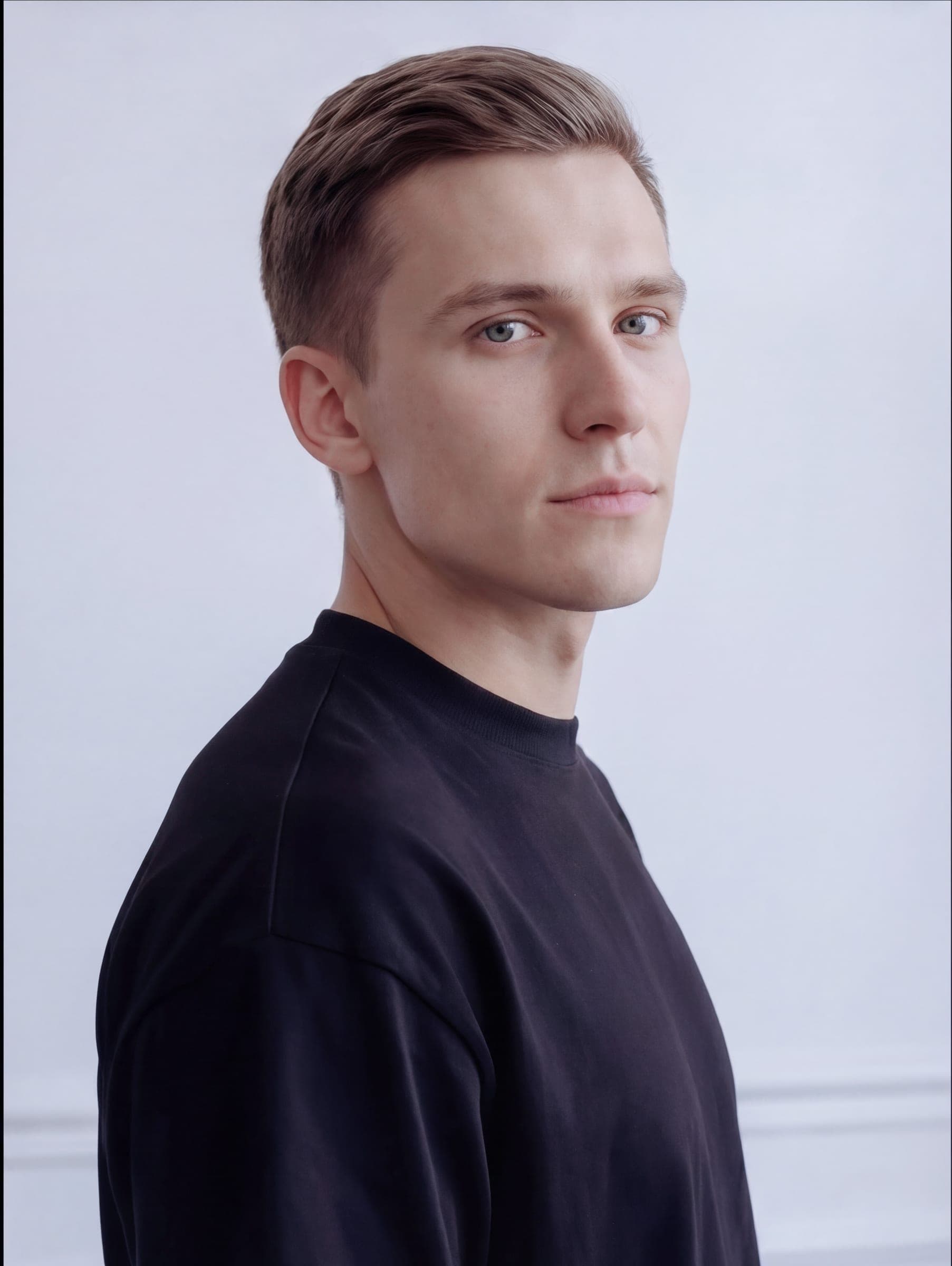 365.APParel Oversize T-shirt Black — man, full body front, looking up, indoor editorial